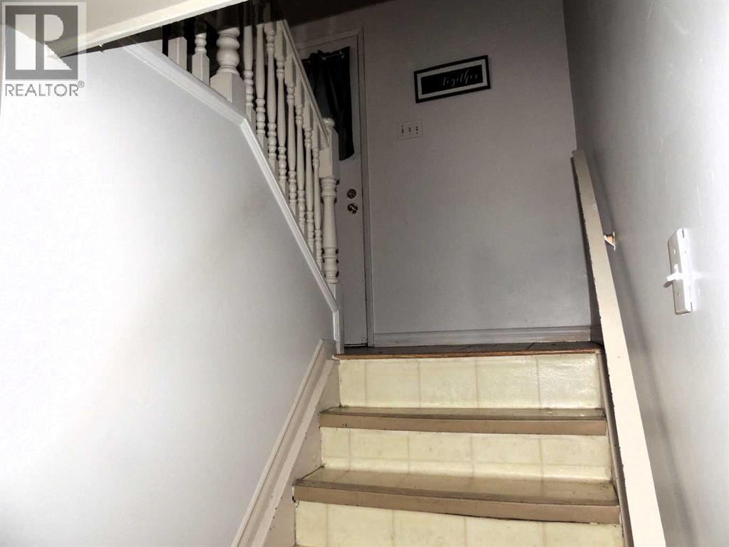 Single Family House Bi-level for Sale in  Canmore Road NW Banff Trail Calgary 