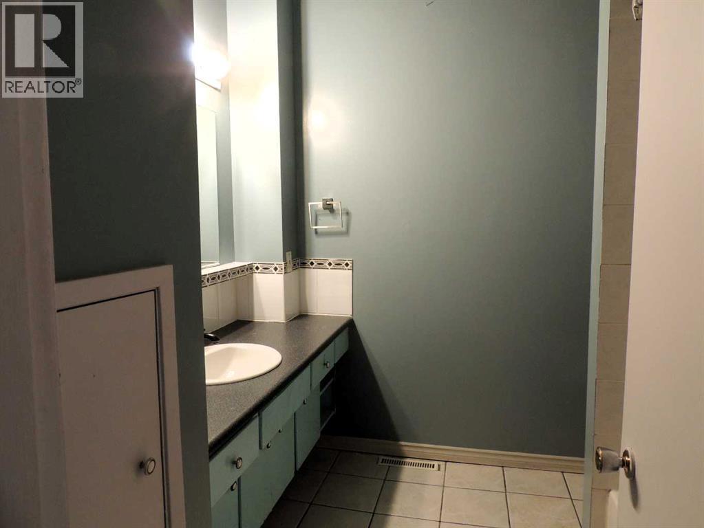 Single Family House Bi-level for Sale in  Canmore Road NW Banff Trail Calgary 