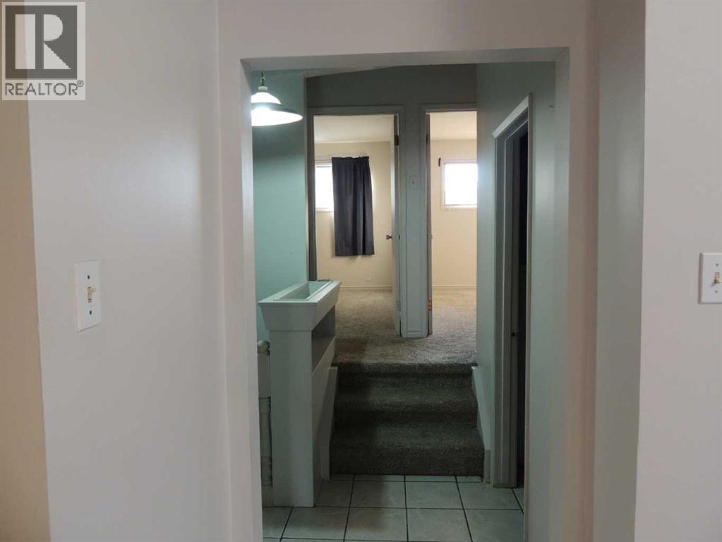 Single Family House Bi-level for Sale in  Canmore Road NW Banff Trail Calgary 