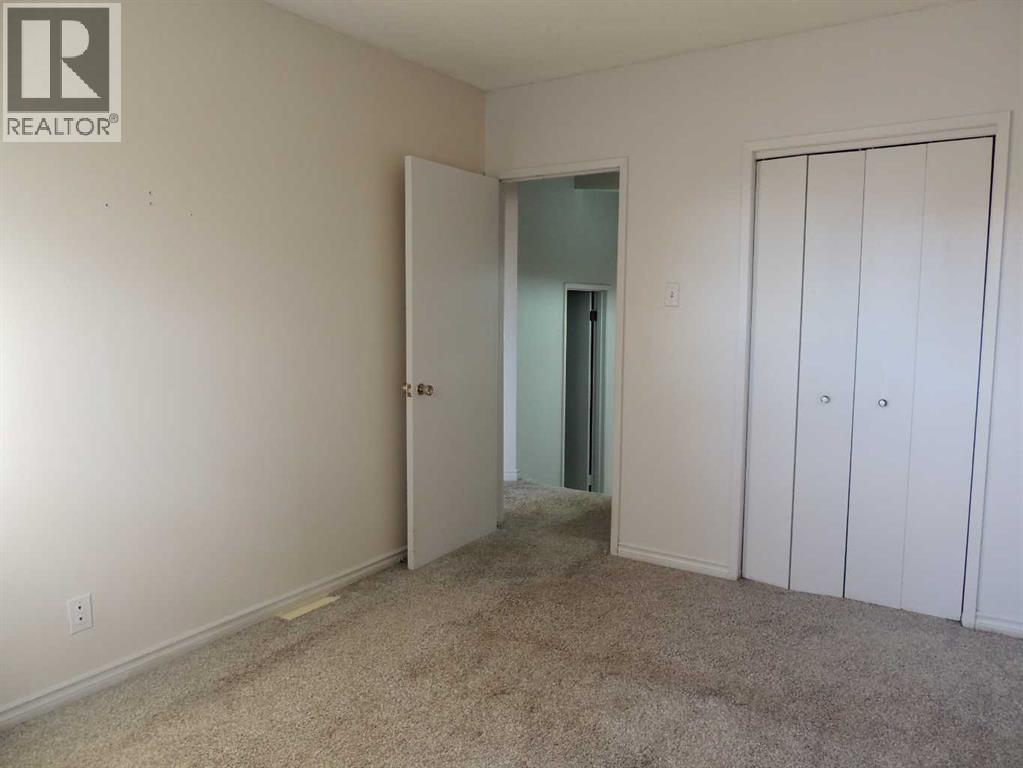 Single Family House Bi-level for Sale in  Canmore Road NW Banff Trail Calgary 