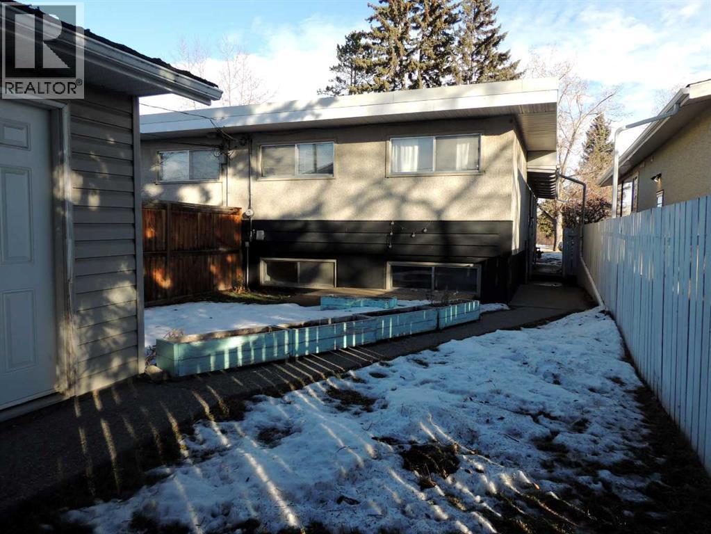 Single Family House Bi-level for Sale in  Canmore Road NW Banff Trail Calgary 