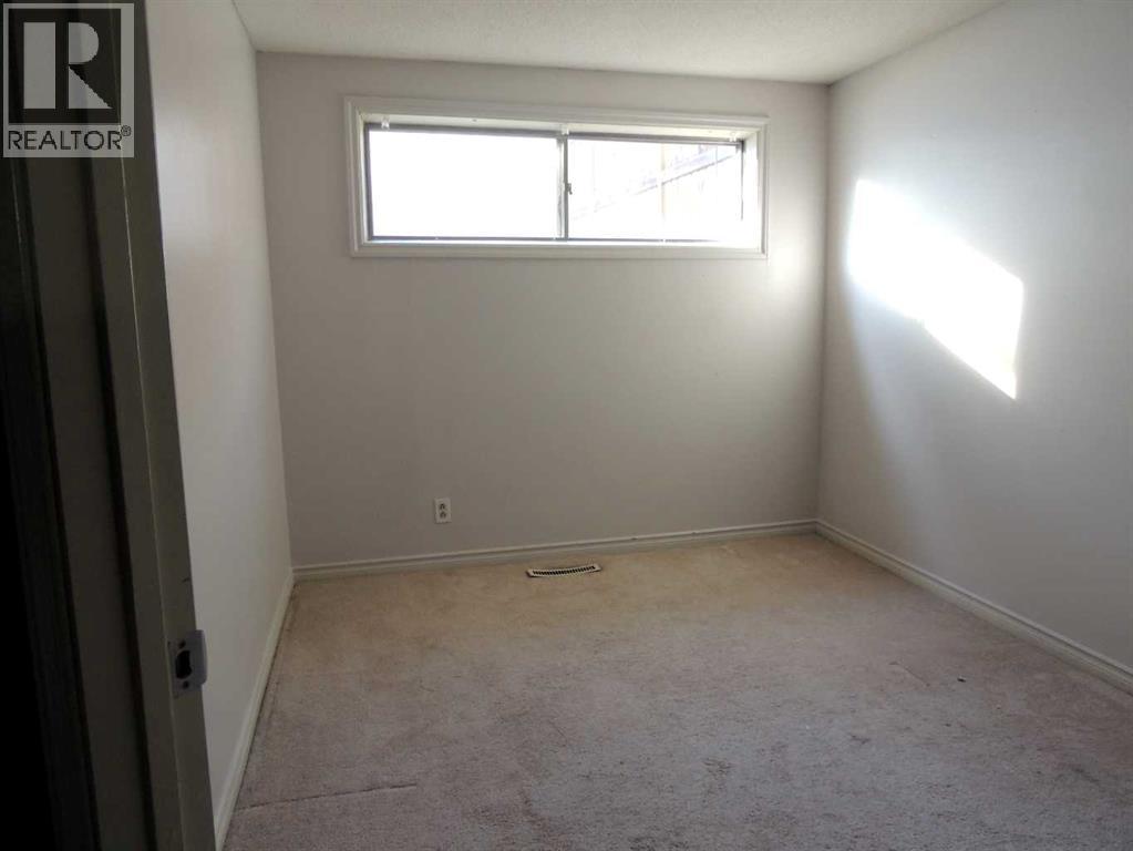 Single Family House Bi-level for Sale in  Canmore Road NW Banff Trail Calgary 