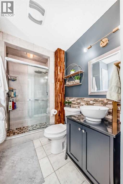 Single Family House Bi-level for Sale in  Macewan Glen Road NW MacEwan Glen Calgary 