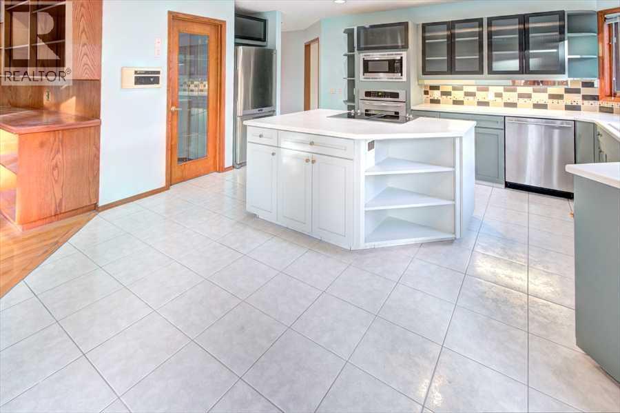 Single Family House for Sale in  Christie Estate Boulevard SW Christie Park Calgary 