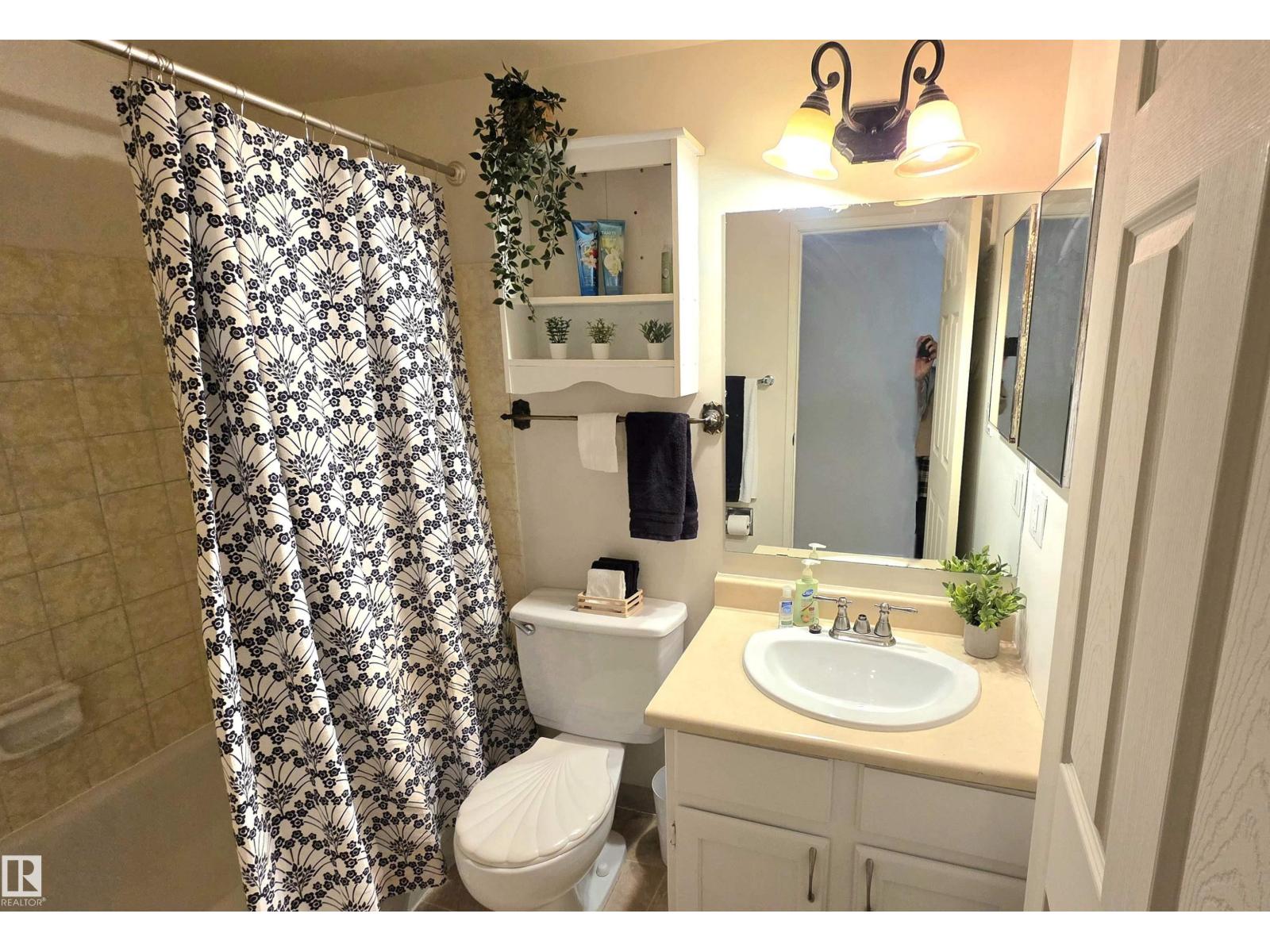 #202 10826 113 ST NW NW - 16