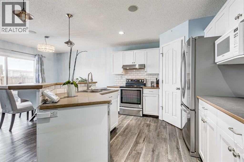 Single Family House for Sale in  New Brighton Circle SE New Brighton Calgary 