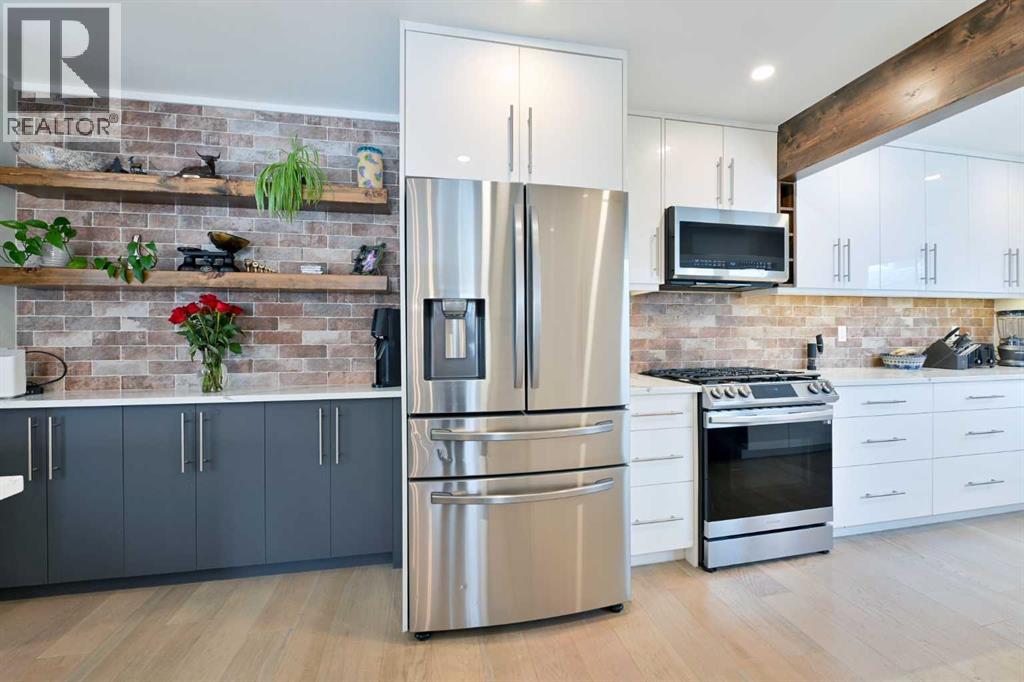 Single Family House Bungalow for Sale in  Lombardy Crescent SW North Glenmore Park Calgary 