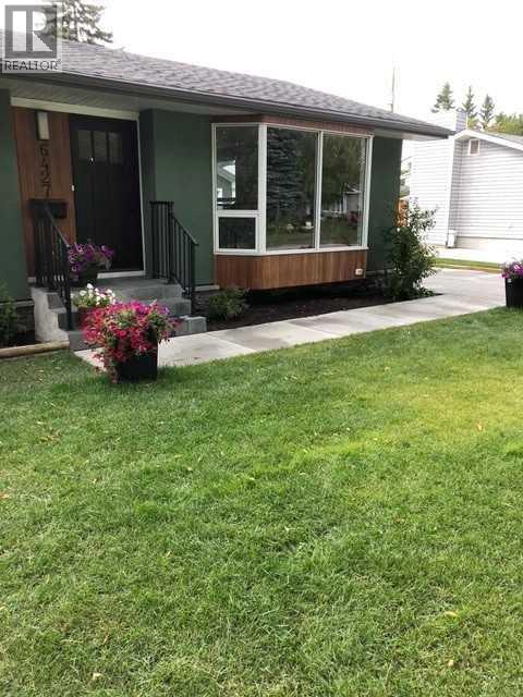 Single Family House Bungalow for Sale in  Lombardy Crescent SW North Glenmore Park Calgary 