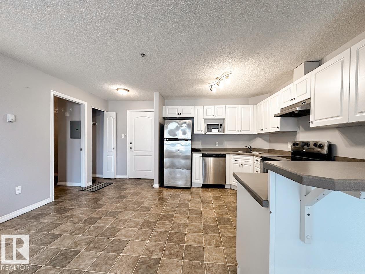 #6315 7331 SOUTH TERWILLEGAR DR NW - 8