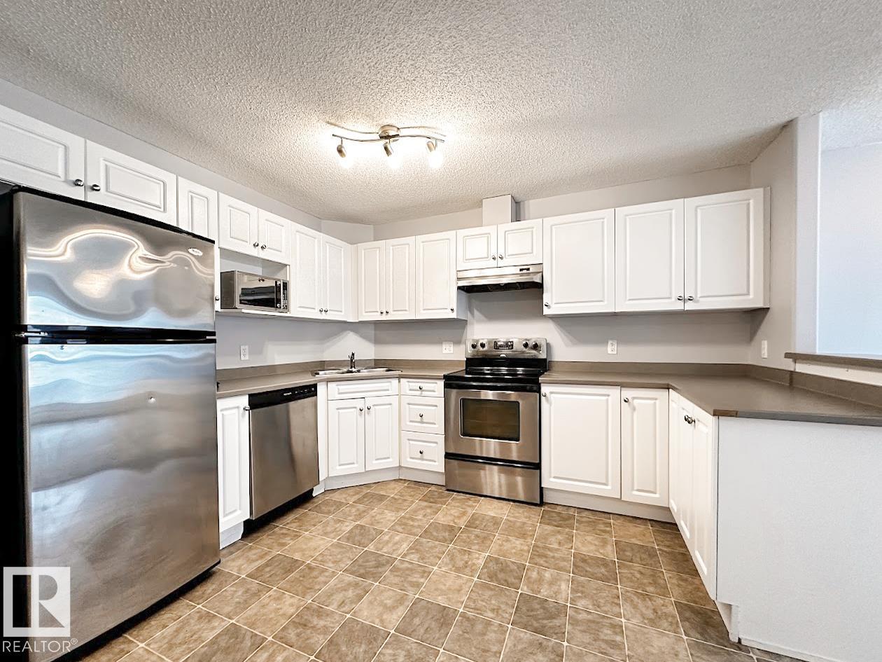 #6315 7331 SOUTH TERWILLEGAR DR NW - 7