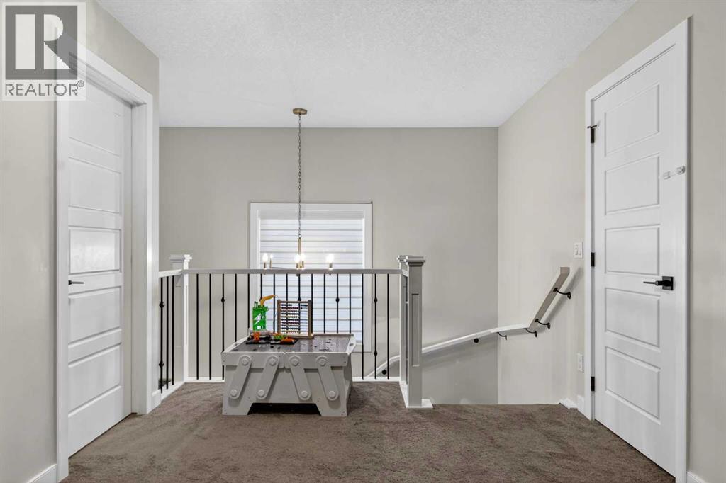 Single Family House for Sale in  Belmont Manor SW Belmont Calgary 
