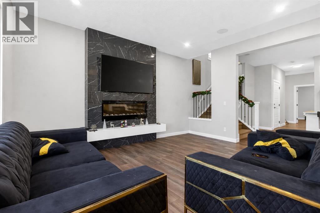 Single Family House for Sale in  Belmont Manor SW Belmont Calgary 