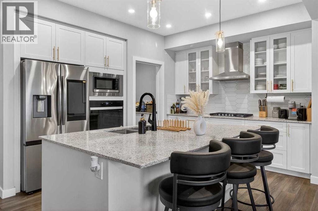 Single Family House for Sale in  Belmont Manor SW Belmont Calgary 