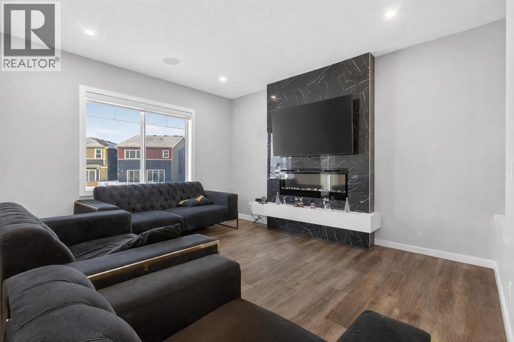 Single Family House for Sale in  Belmont Manor SW Belmont Calgary 