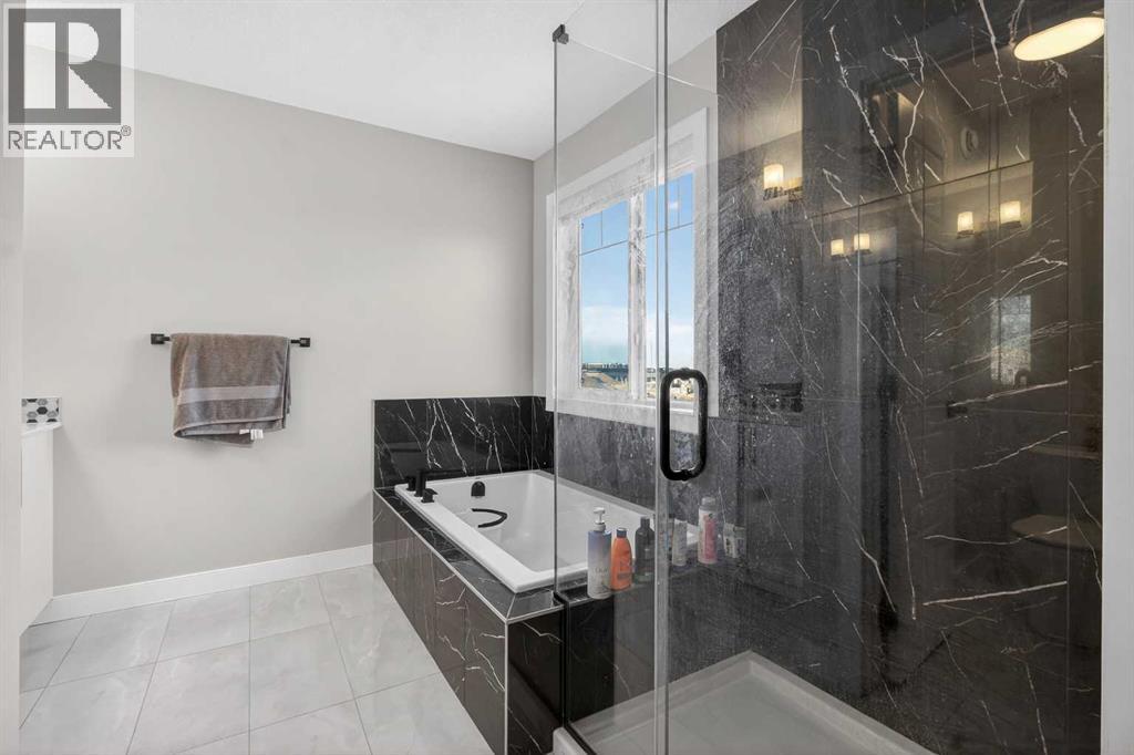 Single Family House for Sale in  Belmont Manor SW Belmont Calgary 