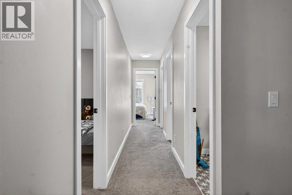 Single Family House for Sale in  Belmont Manor SW Belmont Calgary 