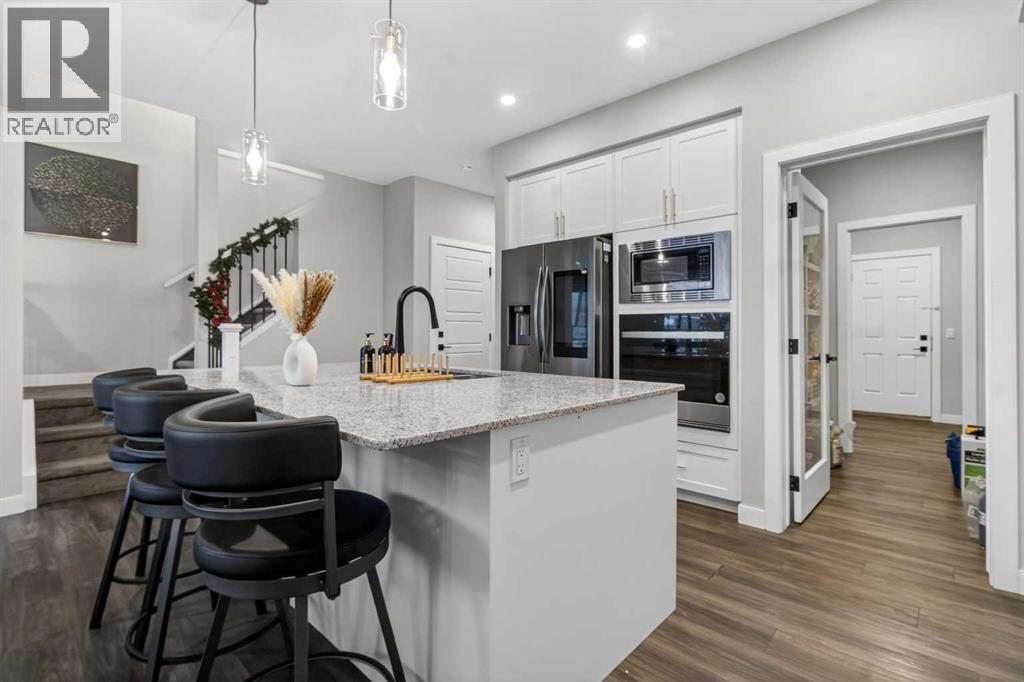 Single Family House for Sale in  Belmont Manor SW Belmont Calgary 