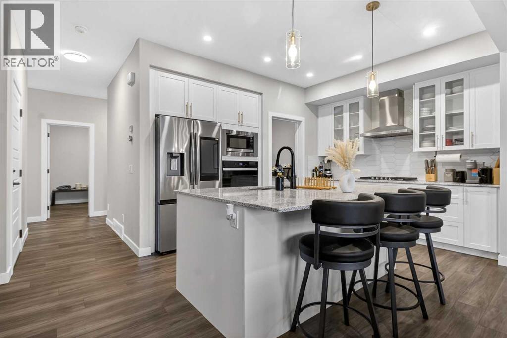 Single Family House for Sale in  Belmont Manor SW Belmont Calgary 