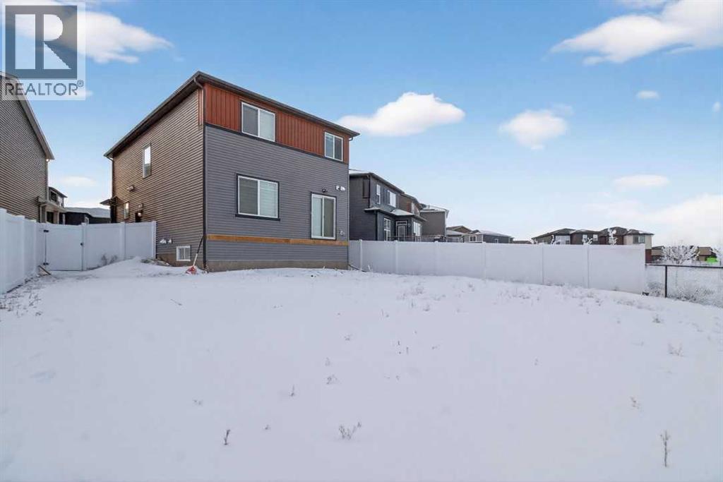 Single Family House for Sale in  Belmont Manor SW Belmont Calgary 