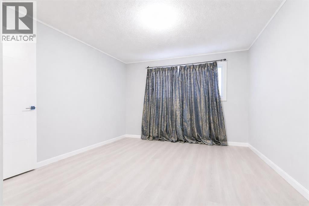 Single Family House Bungalow for Sale in   Avenue NE Pineridge Calgary 