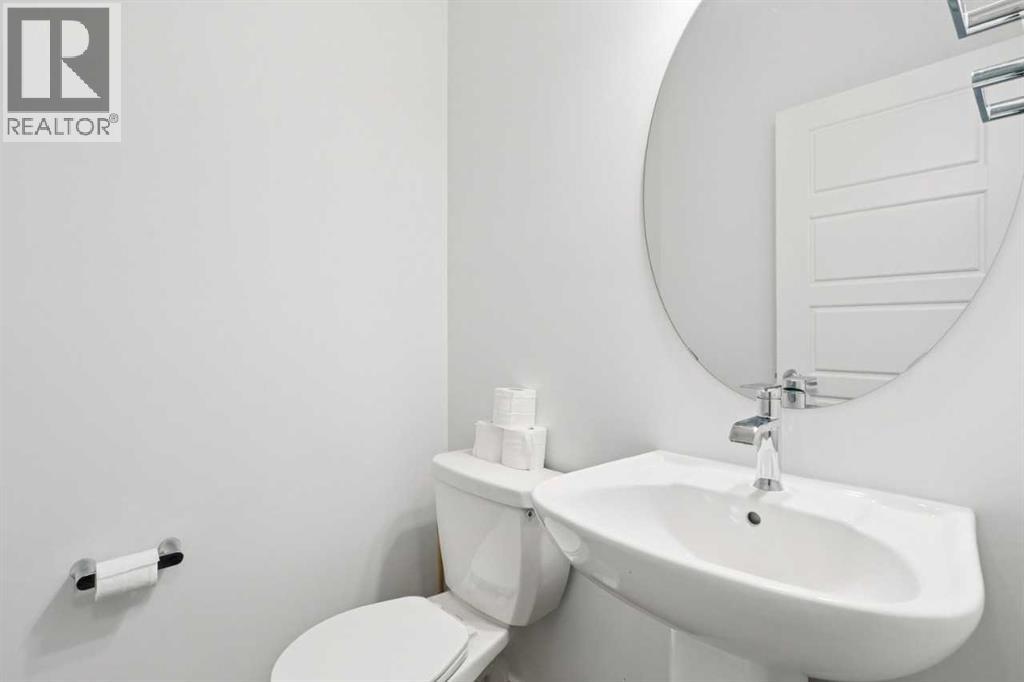 Single Family House for Sale in   Belmont Drive SW Belmont Calgary 