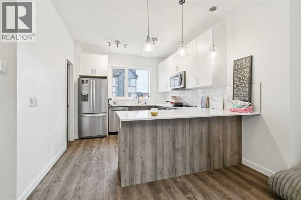 Single Family House for Sale in   Belmont Drive SW Belmont Calgary 