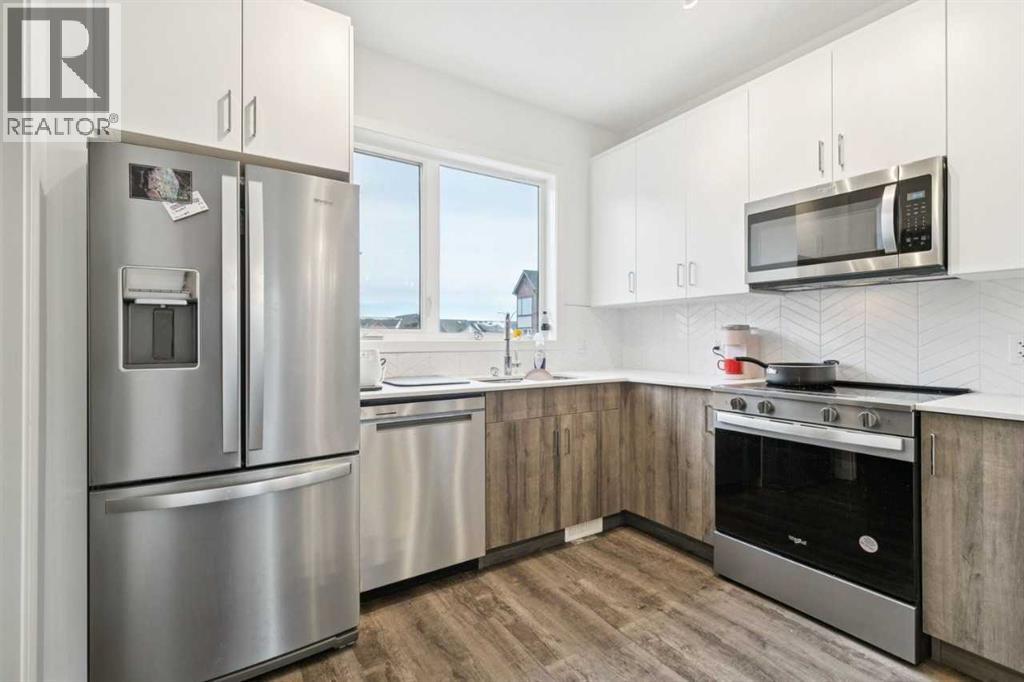 Single Family House for Sale in   Belmont Drive SW Belmont Calgary 