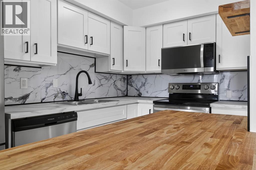 Single Family House for Sale in    Avenue NW Banff Trail Calgary 