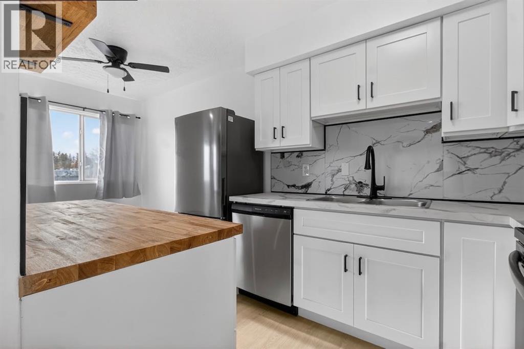 Single Family House for Sale in    Avenue NW Banff Trail Calgary 