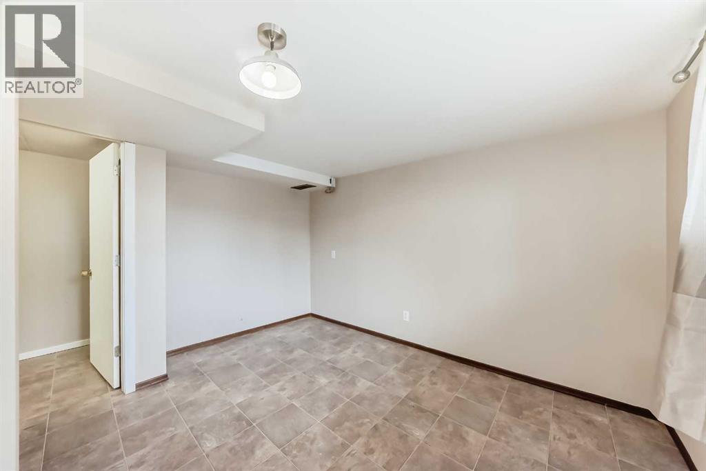 Multi-family House Bi-level for Sale in  Beaver Dam Place NE Thorncliffe Calgary 