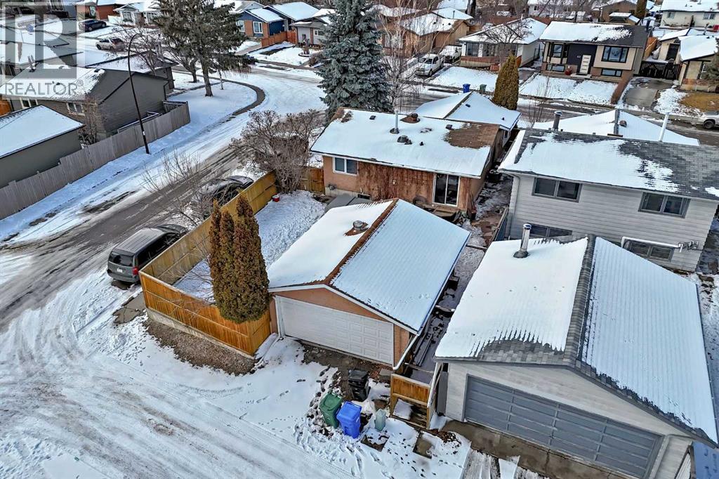 Single Family House Bungalow for Sale in  Midglen Way SE Midnapore Calgary 