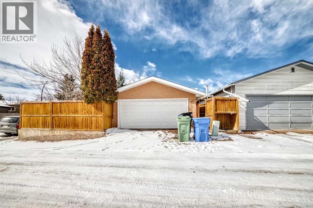 Single Family House Bungalow for Sale in  Midglen Way SE Midnapore Calgary 