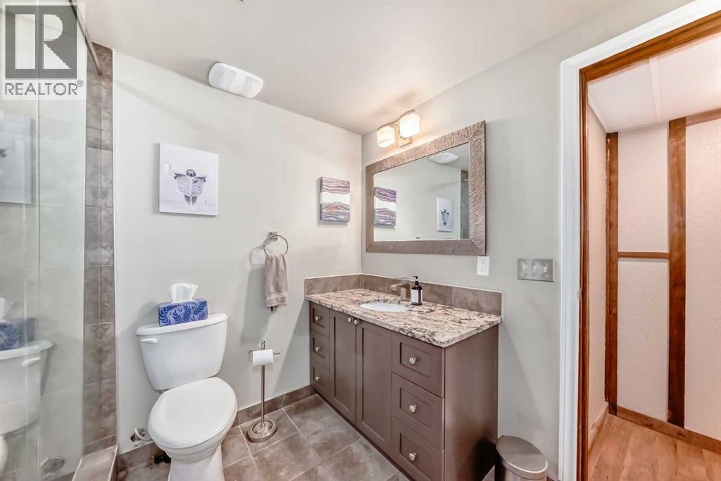 Single Family House Bungalow for Sale in  Midglen Way SE Midnapore Calgary 