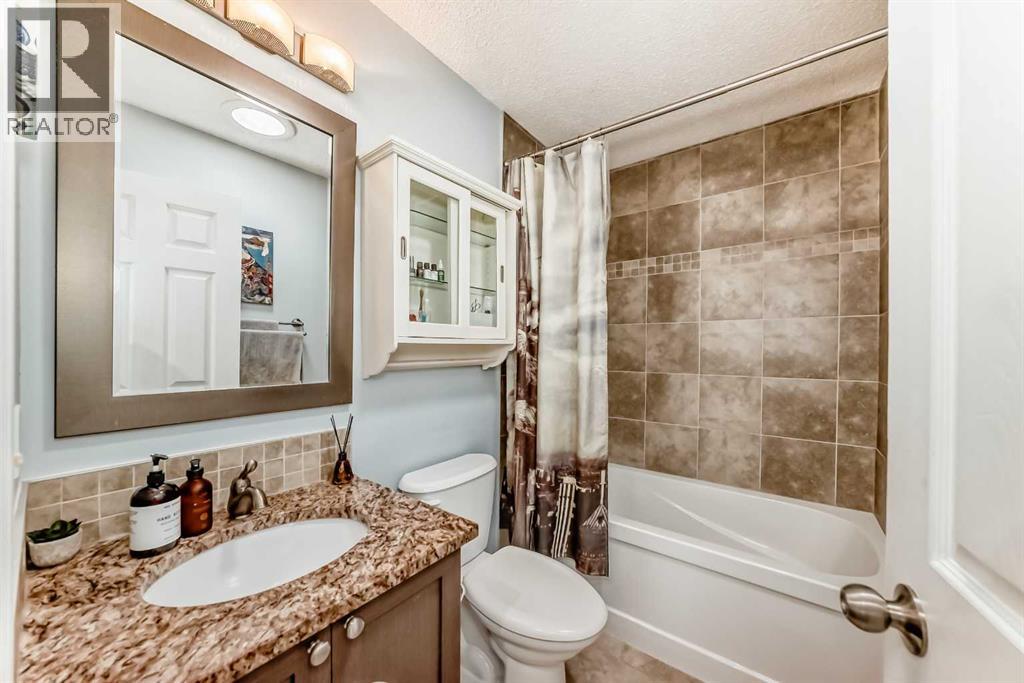 Single Family House Bungalow for Sale in  Midglen Way SE Midnapore Calgary 