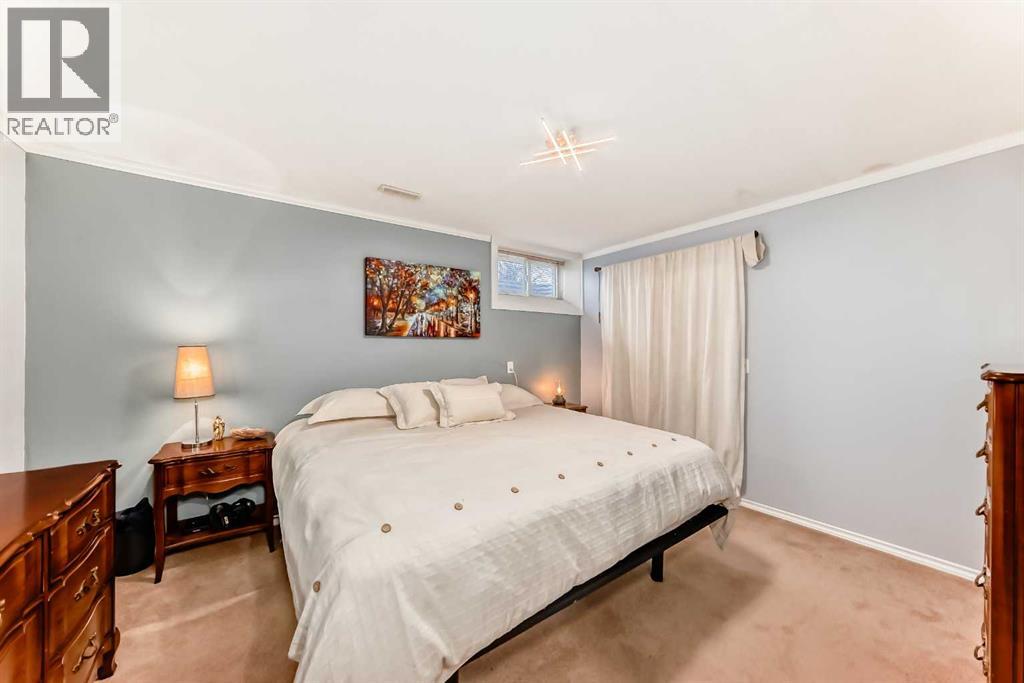 Single Family House Bungalow for Sale in  Midglen Way SE Midnapore Calgary 