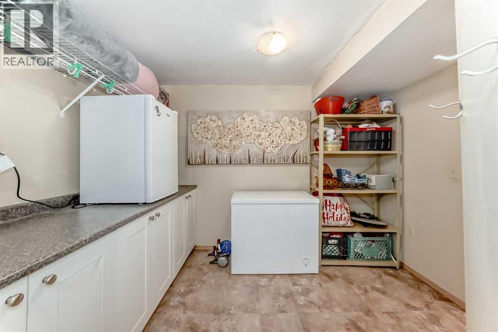 Single Family House Bungalow for Sale in  Midglen Way SE Midnapore Calgary 