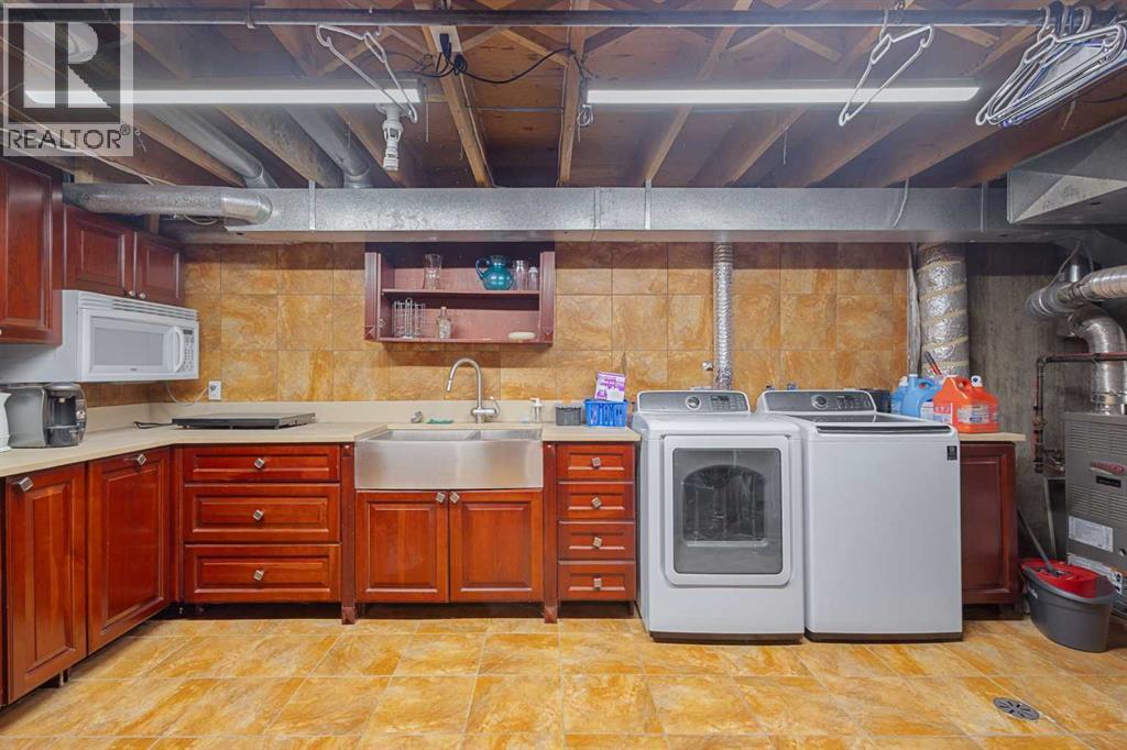 Single Family House for Sale in  Wood Crescent SW Woodlands Calgary 