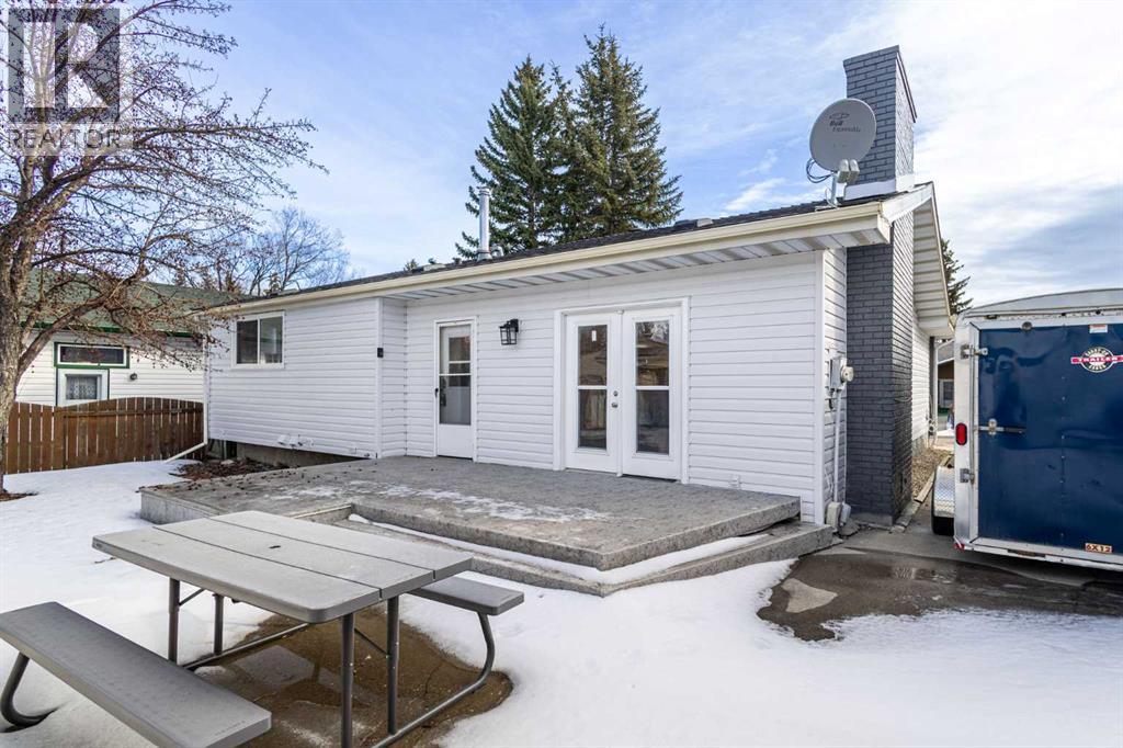 Single Family House Bungalow for Sale in  Woodpark Place SW Woodlands Calgary 