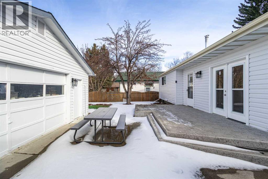 Single Family House Bungalow for Sale in  Woodpark Place SW Woodlands Calgary 