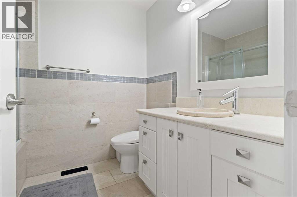 Single Family House Bungalow for Sale in  Woodpark Place SW Woodlands Calgary 