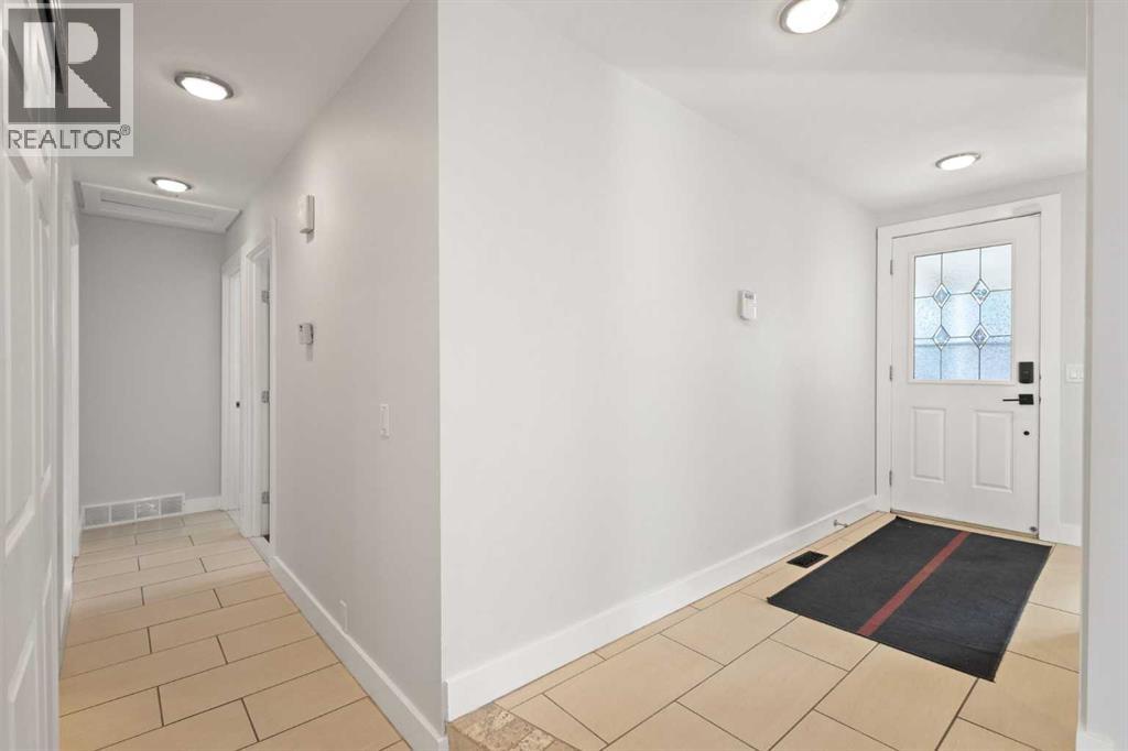 Single Family House Bungalow for Sale in  Woodpark Place SW Woodlands Calgary 