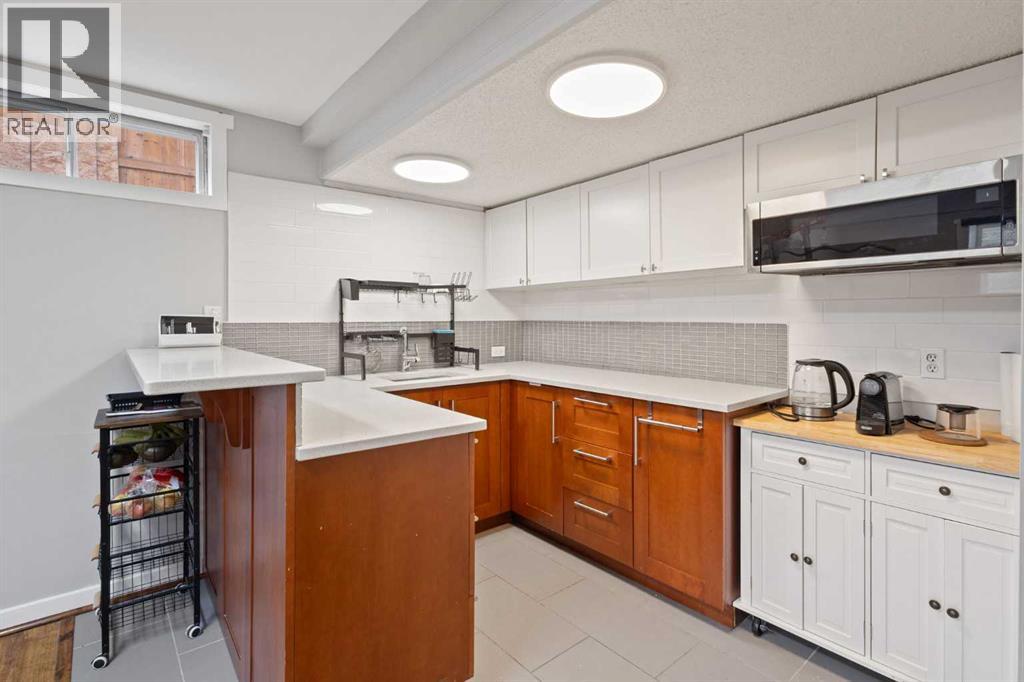 Single Family House Bungalow for Sale in  Woodpark Place SW Woodlands Calgary 