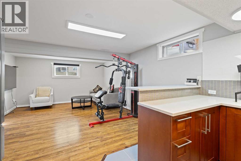 Single Family House Bungalow for Sale in  Woodpark Place SW Woodlands Calgary 