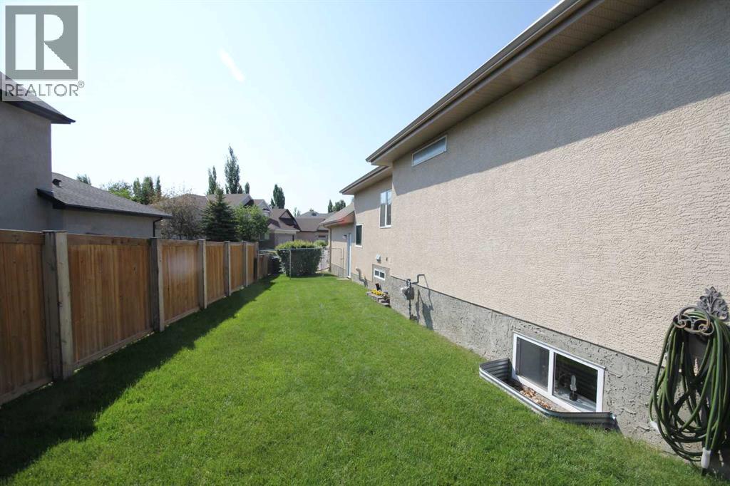 Single Family House Bungalow for Sale in  Cranleigh Gardens SE Cranston Calgary 