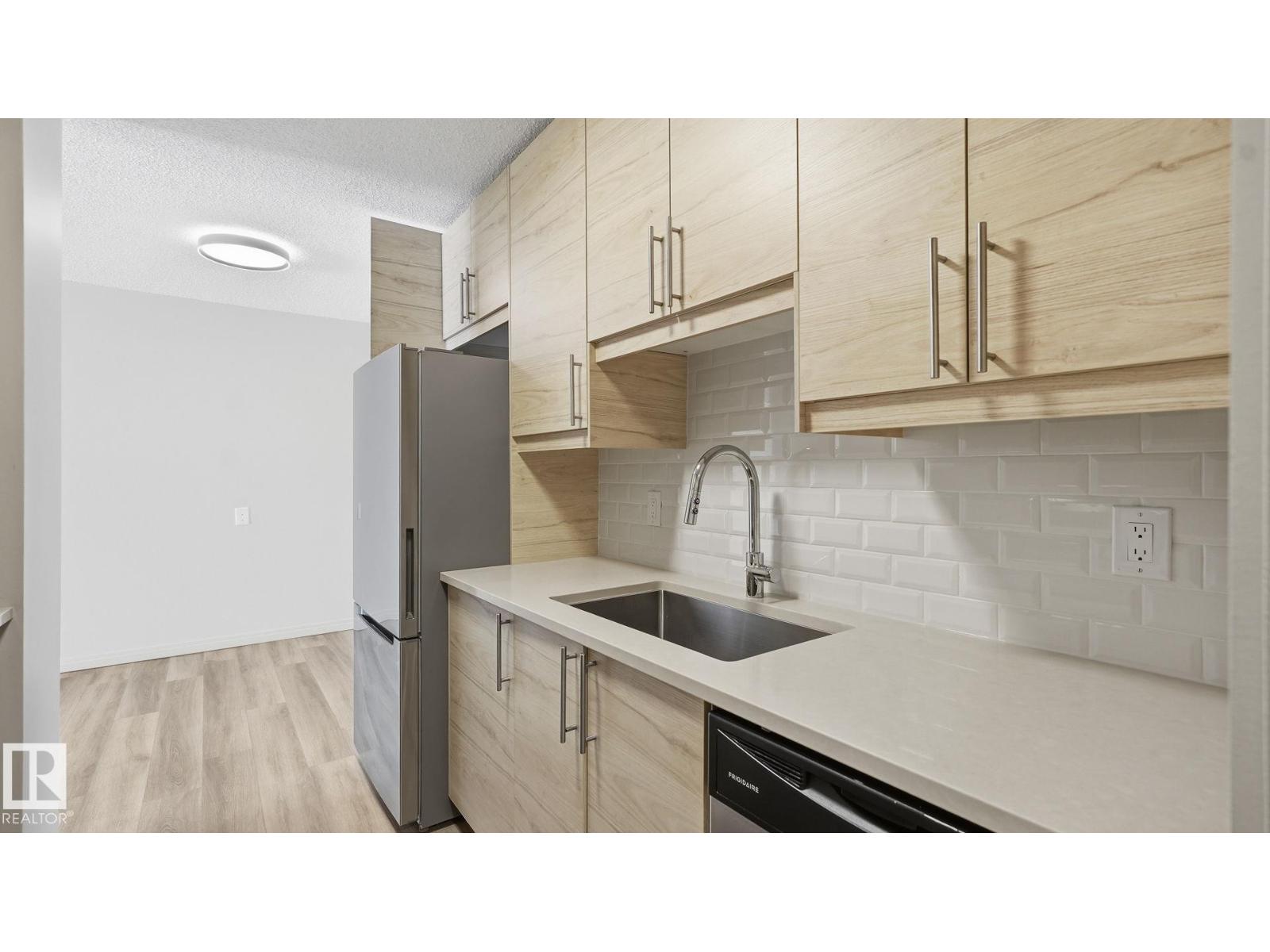 #406 12121 JASPER AV NW - 5