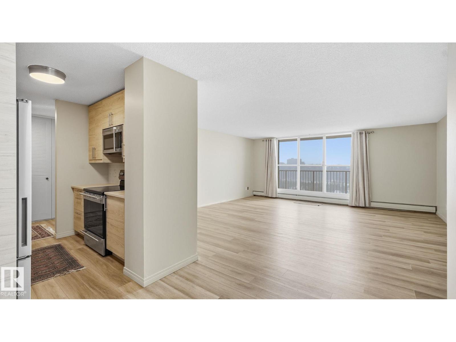 #406 12121 JASPER AV NW - 9
