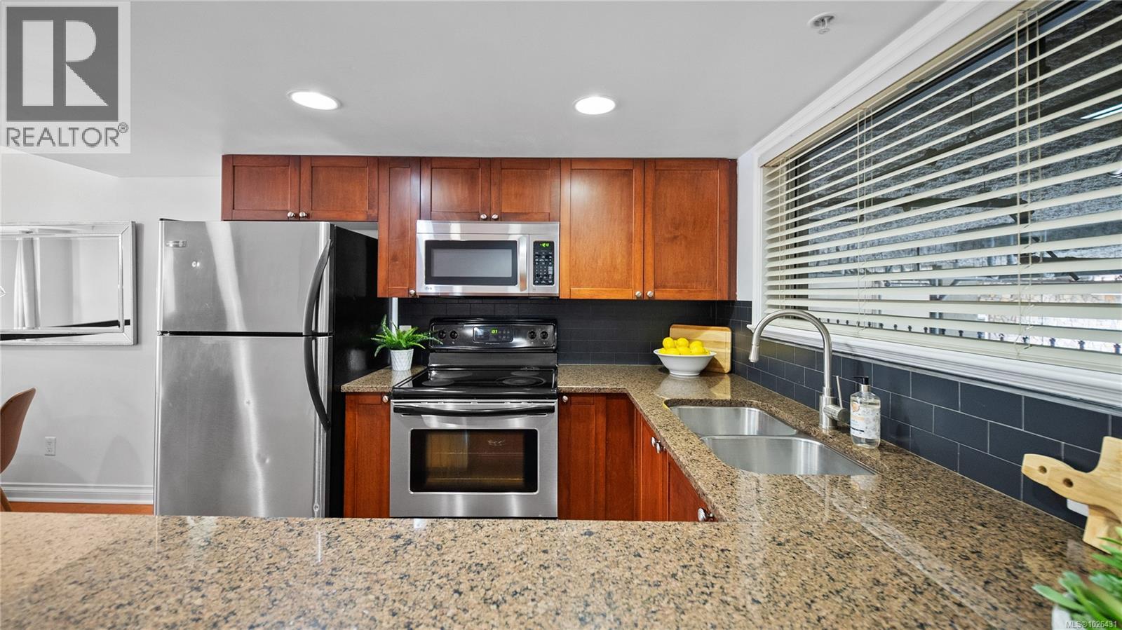 #102 866 GOLDSTREAM AVE - 13