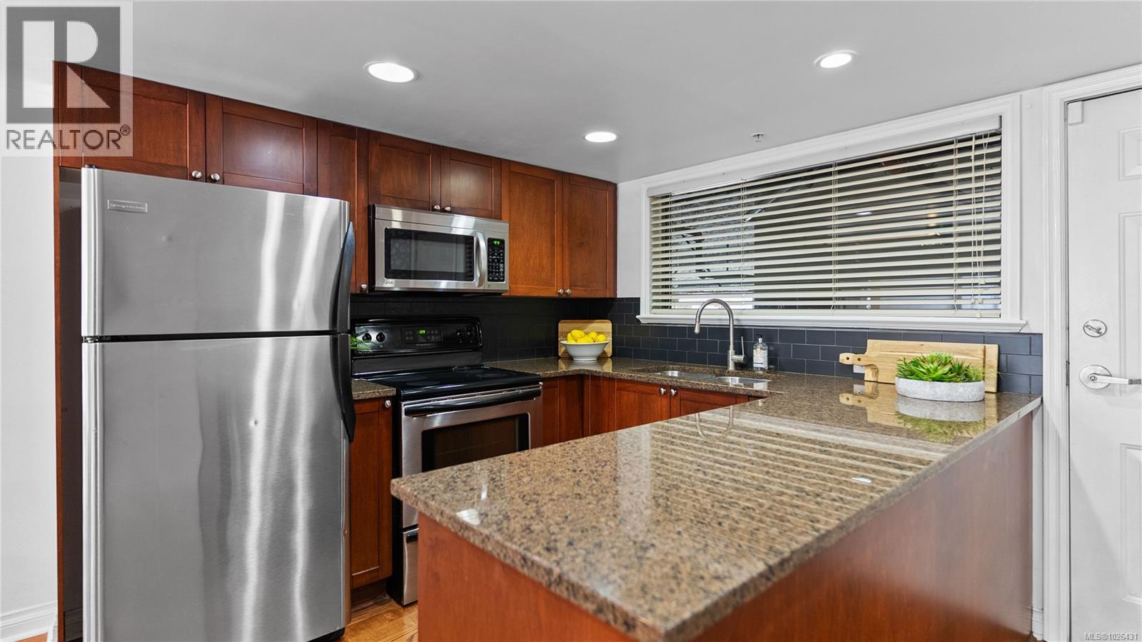 #102 866 GOLDSTREAM AVE - 11