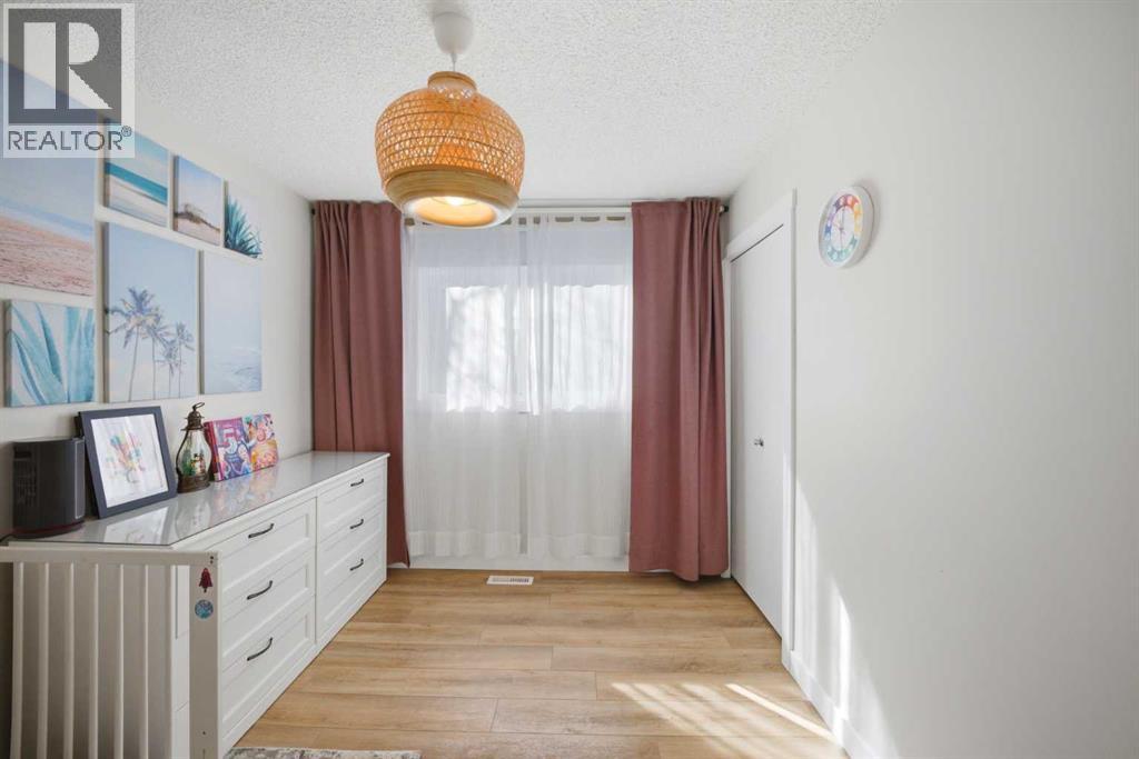 Single Family House Bungalow for Sale in  Wood Oak Way SW Woodlands Calgary 