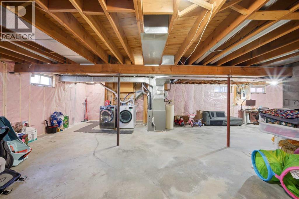 Single Family House Bungalow for Sale in  Wood Oak Way SW Woodlands Calgary 